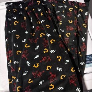 Black Plush Pajama Pants with Red and Yellow Print